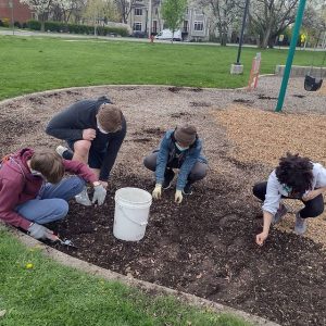 Lovelace Park Evanston IL park cleanup weeding high school volunteers.